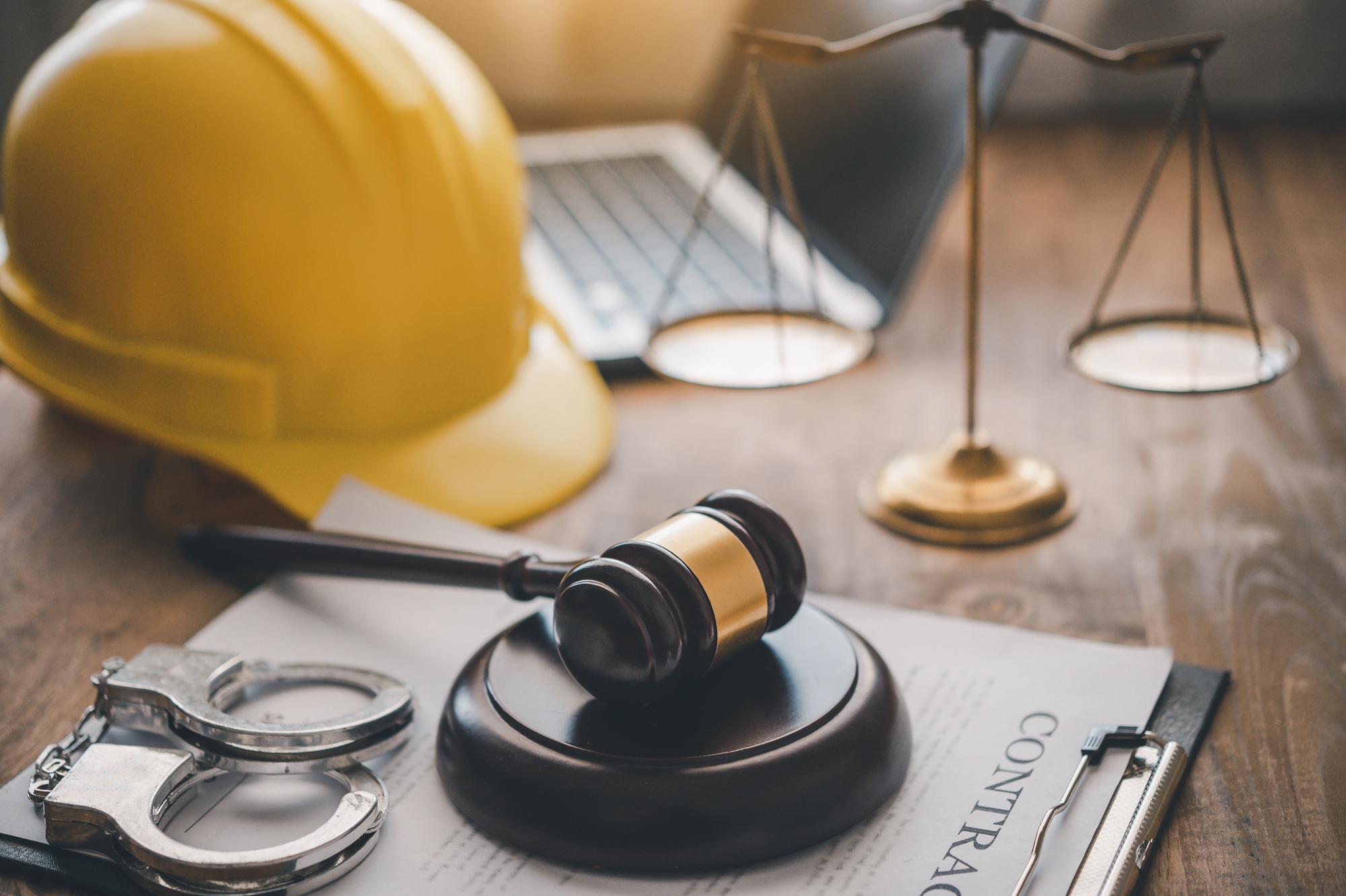 Judge's hammer and helmet Law and Justice about labor law concept Construction law.